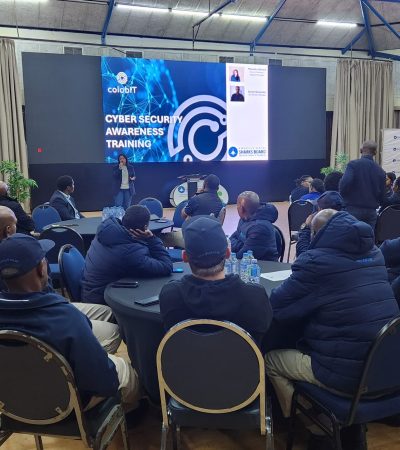 Employees attentively listening to the presentation